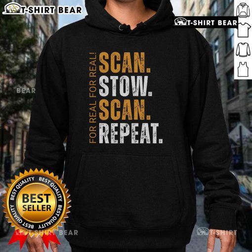 Warehouse worker wearing a 'Top Scan Stow Scan Repeat' hoodie, focused on efficient inventory management tasks.