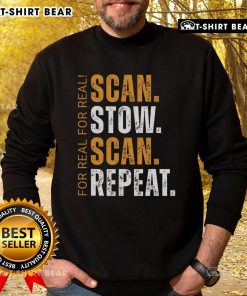 Warehouse worker wearing a 'Top Scan Stow Scan Repeat' sweatshirt, embodying efficiency and productivity in logistics.