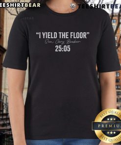 Alt Text: Senator Cory Booker speaking on the Senate floor for 25 hours, featured on a 2025 ladies tee shirt.