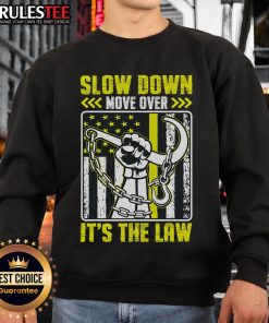 Cozy 'Slow Down Move Over It's The Law' sweatshirt for tow operators, promoting safety on the road in style.