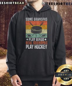 Grandpa wearing 'Real Grandpas Play Hockey' hoodie, enjoying a game on ice, showcasing love for hockey over bingo.