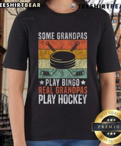Graphic tee featuring the phrase 'Real Grandpas Play Hockey' for ladies, perfect for hockey-loving grandfathers.