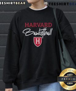 Steve Kerr wearing a Harvard basketball sweatshirt, showcasing his stylish support for the team.