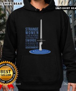 Strange women lying in ponds distributing swords on a hoodie, humorously challenging government systems and authority.