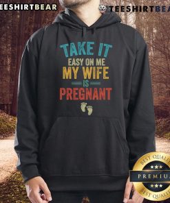 Vintage hoodie featuring 'Take It Easy On Me, My Wife Is Pregnant' design, perfect for expectant fathers and casual wear.