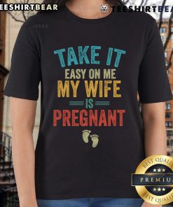 Vintage ladies tee featuring 'Take It Easy On Me, My Wife Is Pregnant' graphic, perfect for expectant moms and casual wear.