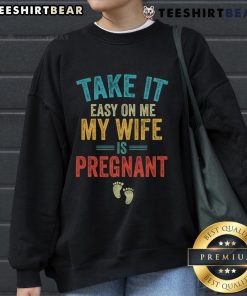 Vintage sweatshirt featuring 'Take It Easy On Me, My Wife Is Pregnant' design, perfect for expecting parents.