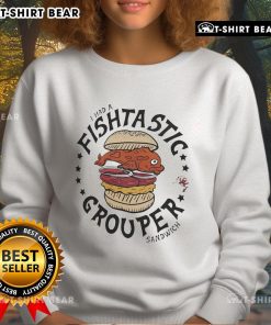 Alt Text: Top Tampa Bay Buccaneers sweatshirt featuring Guy Fieri's Flavortown, showcasing a 'Fishtastic' grouper sandwich.