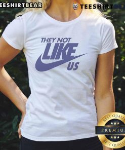 Alt Text: Nike ladies tee featuring 'Top-They-Not-Like-Us' design, perfect for casual wear and sports activities.