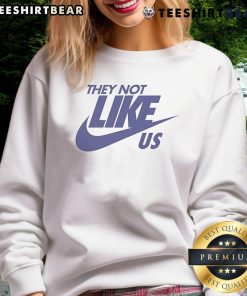 Stylish Top-They-Not-Like-Us Nike sweatshirt in black, perfect for casual wear and street style enthusiasts.