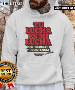 Top Tu Lucha Es Mi Lucha hoodie displayed on a hanger, showcasing vibrant colors and bold graphic design for wrestling fans.