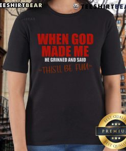 Premium ladies tee featuring the quote 'When God Made Me He Grinned And Said This'll Be Fun' in stylish font.