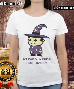 Top Wizard Needs Hugs Badly Ladies Tee featuring a whimsical design with a wizard character in need of affection.