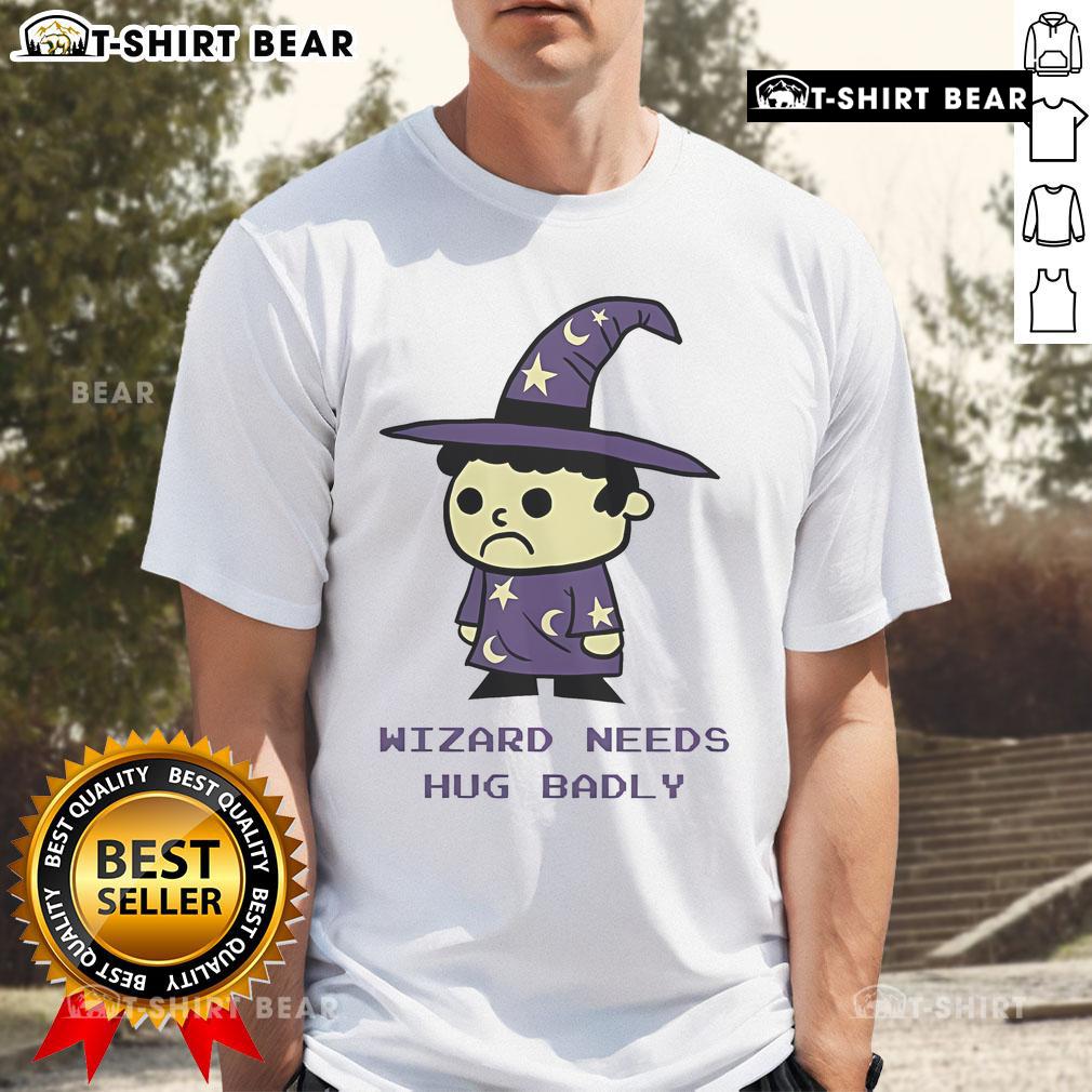 Top Wizard Needs Hugs Badly T Shirt Top Wizard Needs Hugs Badly T-Shirt featuring a whimsical graphic of a wizard asking for hugs in vibrant colors.