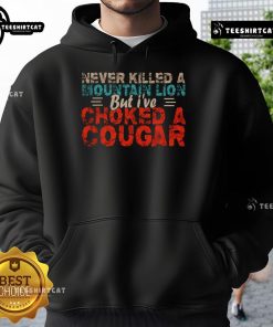Alt Text: Funny Never Killed a Mountain Lion But I've Choked a Cougar Hoodie, showcasing a humorous design for animal lovers.