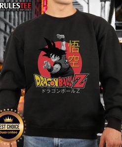 Alt Text: Vintage 90s Dragon Ball Z Goku Saiyan sweatshirt featuring iconic anime design and vibrant colors. Perfect for fans!