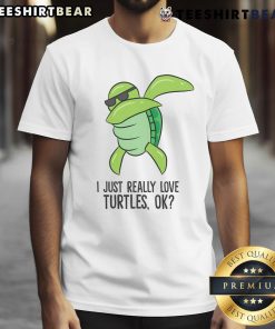 Dabbing turtle graphic on a T-shirt with the phrase 'Awesome I Just Really Love Turtles Ok' in vibrant colors.