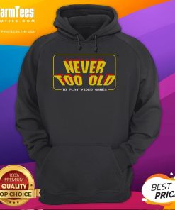 Retro player wearing an 'Awesome Never Too Old to Play Video Games' hoodie, showcasing a love for gaming at any age.