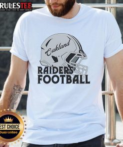 Awesome NFL Oakland Raiders football helmet T-shirt featuring bold graphics and a stylish design for fans.