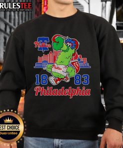 Awesome Phillie Phanatic mascot on a Philadelphia skyline sweatshirt, perfect for Philadelphia Phillies fans.