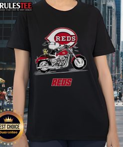 Alt Text: Snoopy and Woodstock riding a motorbike on a Cincinnati Reds ladies tee, perfect for fans and casual wear.