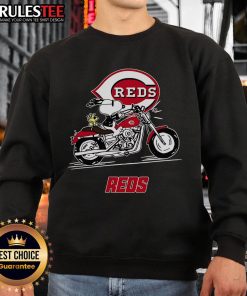Awesome Snoopy and Woodstock driving a motorbike on a Cincinnati Reds sweatshirt, perfect for fans and collectors.