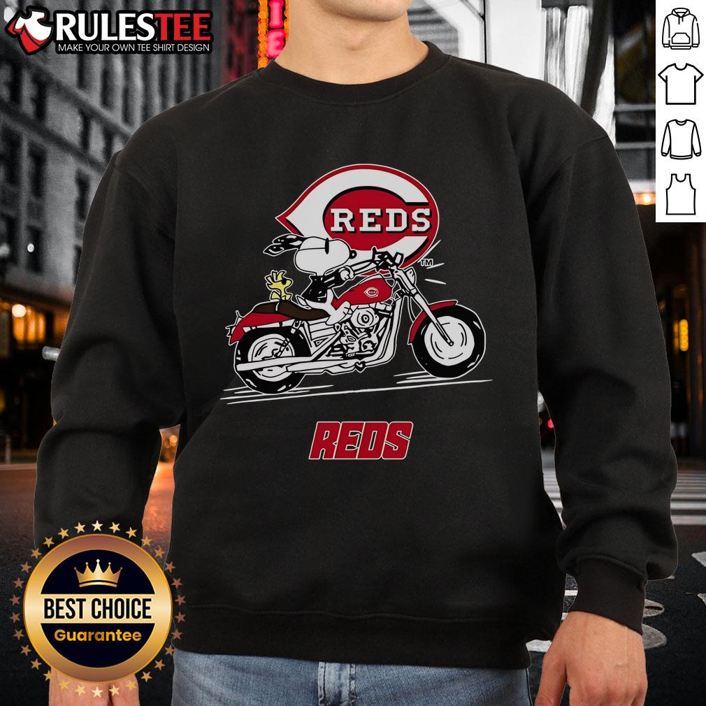 Awesome Snoopy And Woodstock Driving Motorbike Cincinnati Reds Sweatshirt Awesome Snoopy and Woodstock driving a motorbike on a Cincinnati Reds sweatshirt, perfect for fans and collectors.
