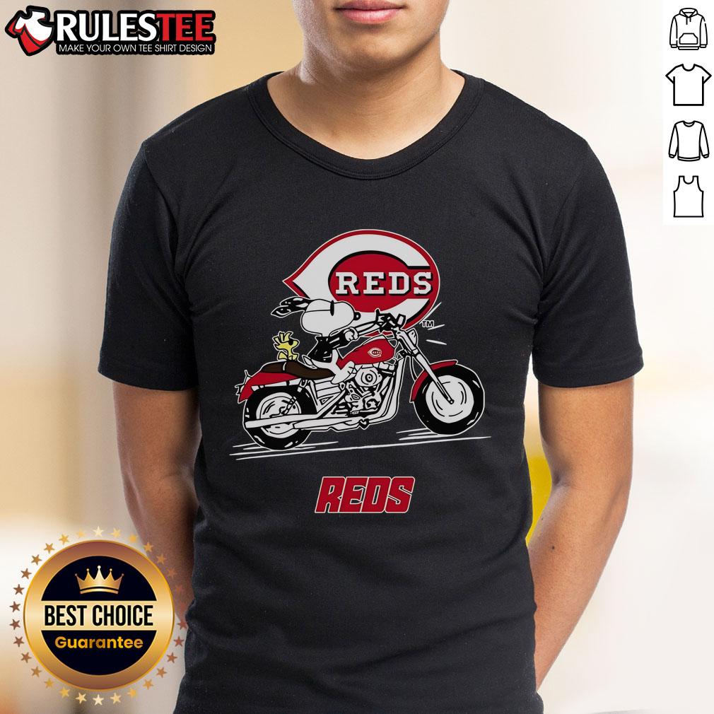 Awesome Snoopy And Woodstock Driving Motorbike Cincinnati Reds T Shirt Awesome Snoopy and Woodstock driving motorbike on Cincinnati Reds T-Shirt, perfect for fans and collectors.