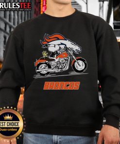 Alt Text: Snoopy and Woodstock riding a motorbike in a Denver Broncos sweatshirt, showcasing a fun and stylish design.