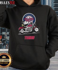 Alt Text: Snoopy and Woodstock riding a motorbike in a colorful Minnesota Twins hoodie, showcasing playful cartoon style.