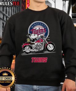 Snoopy and Woodstock riding a motorbike on a Minnesota Twins sweatshirt, showcasing a fun and vibrant design.