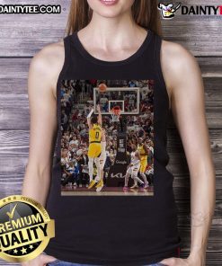 Alt Text: Tyrese Haliburton in Indiana Pacers tank top during 2025 NBA game, showcasing his awesome skills on the court.