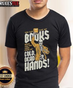 Skeleton T-Shirt featuring 'You Can Take My Books When You Pry Them From My Cold Dead Hands' design for book lovers.