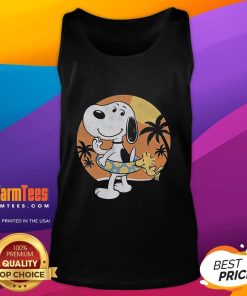 Cute beagle wearing a sun block tank top, perfect for summer outings and pet fashion enthusiasts.