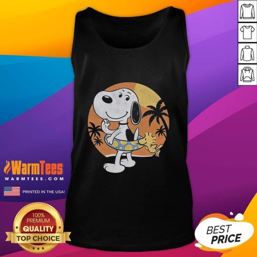 Cute beagle wearing a sun block tank top, perfect for summer outings and pet fashion enthusiasts.