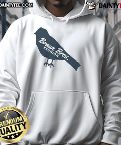 Cute Braun Brothers reunion in cozy bird hoodie, showcasing family warmth and style in a cheerful outdoor setting.