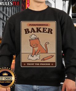 Alt Text: Cute cat in a chef hat baking, wearing 'Purrfessional Baker' sweatshirt, perfect for cat lovers and baking enthusiasts.