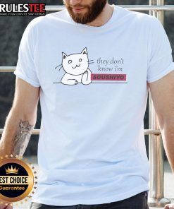 Cute cat wearing 'They Dont Know Im Soushiyo' T-shirt, showcasing adorable feline fashion.