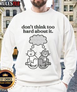 Alt Text: Cozy 'Cute Cats Don't Think Too Hard About It' sweatshirt featuring playful cat graphics in soft fabric.