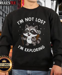 Cute 'I'm Not Lost, I'm Exploring' sweatshirt in a cozy setting, perfect for casual outings and adventures.