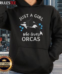 Cute girl wearing a hoodie with orcas, showcasing her love for killer whales and the ocean.