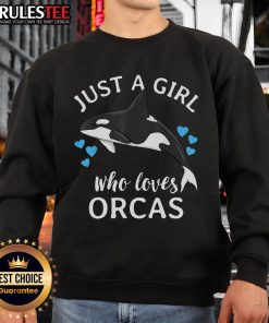 Alt Text: Cute girl wearing a sweatshirt that says Just a Girl Who Loves Orcas with killer whales in a vibrant ocean setting.