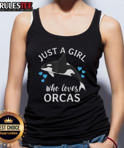 Alt Text: Cute girl wearing a tank top with orcas design, expressing her love for killer whales and the ocean.