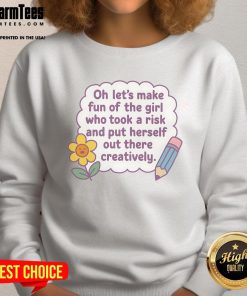 Cute sweatshirt featuring a playful graphic about embracing creativity and taking risks in self-expression.
