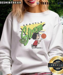 Alt Text: Cute Peanuts Marcie x Seattle Storm sweatshirt featuring vibrant colors and a playful design perfect for fans.
