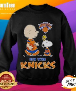 Cute Peanuts New York Knicks sweatshirt featuring Charlie Brown and friends in team colors, perfect for fans.