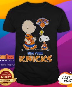 Cute Peanuts New York Knicks T-Shirt featuring iconic characters in team colors, perfect for fans and collectors.