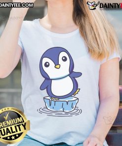 Cute penguin standing on an ice floe, featured on a ladies tee, perfect for animal lovers and winter fashion.