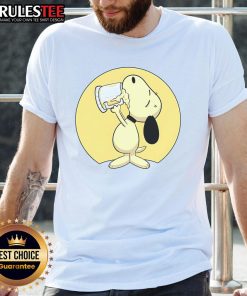 Cute Snoopy drinking beer t-shirt design featuring the beloved cartoon character enjoying a beverage.
