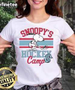 Cute Snoopy in Seattle Kraken gear at Snoopy's Hockey Camp, featuring NHL teams on a ladies tee shirt.